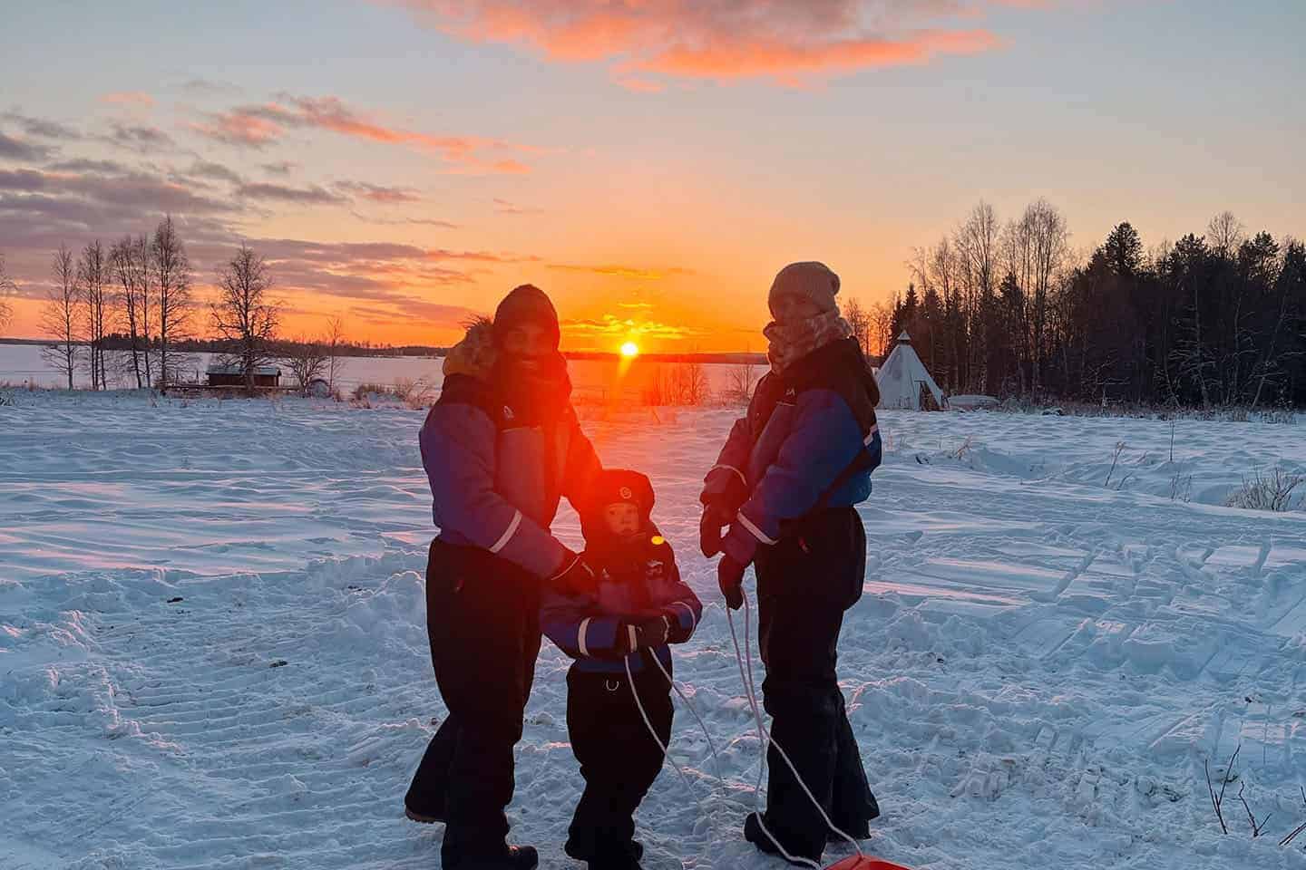family visiting apukka resort rovaniemi lapland finland