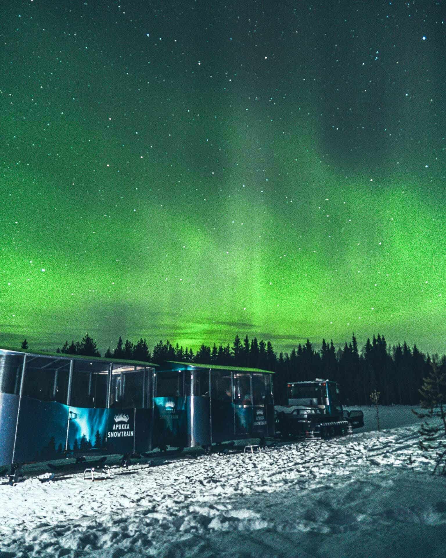 northern lights hunting snow train apukka resort rovaniemi lapland finland
