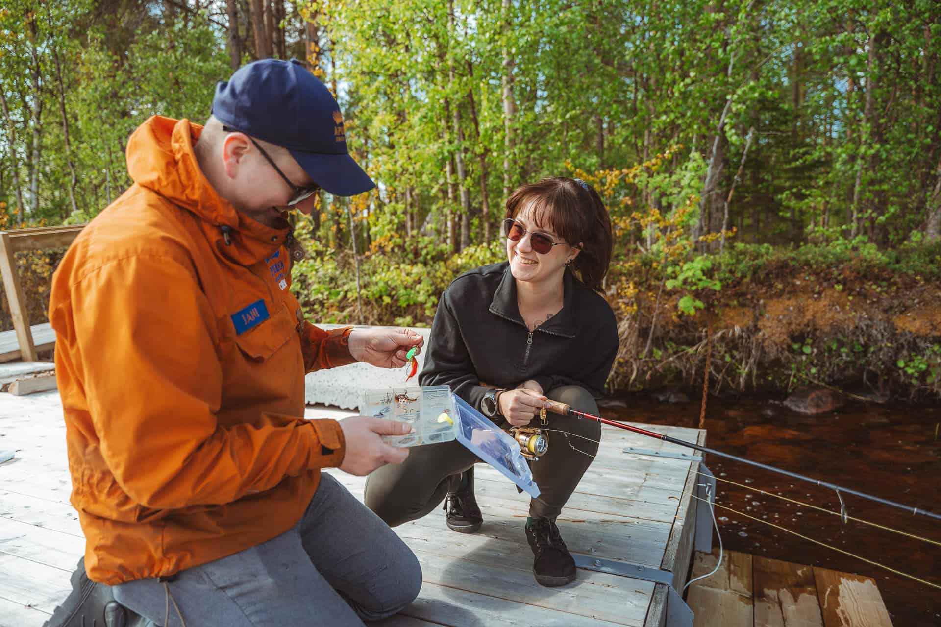 guests fishing on a dock